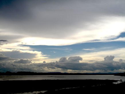 sunset by the mekong